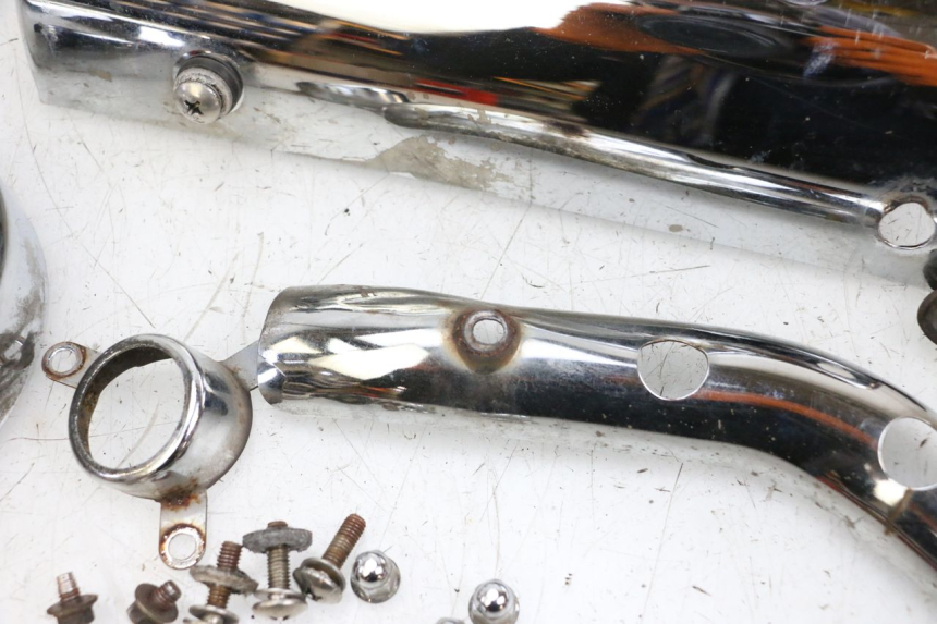 photo de AUSPUFFBLENDE KYMCO GRAND DINK 125 (2002 - 2007) - Geprüftes Gebrauchtteil